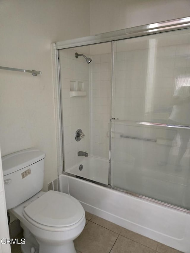 1174 Greene Ter, Davis, CA 95618 - full bath featuring shower / bath combination with glass door, tile patterned floors, and toilet