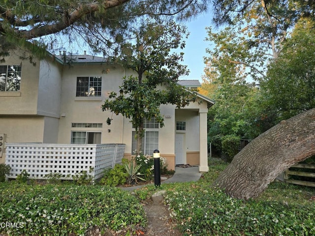 1174 Greene Ter, Davis, CA 95618 - view of front facade featuring stucco siding