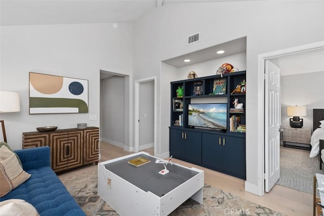 12 Argos, Laguna Niguel, CA 92677 - living area with light wood-type flooring, high vaulted ceiling, and baseboards