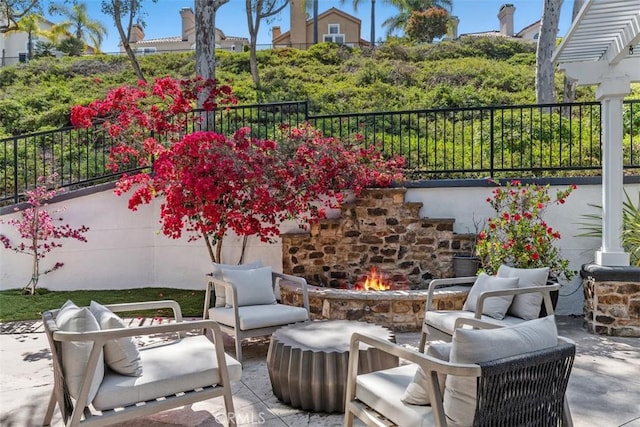 12 Argos, Laguna Niguel, CA 92677 - view of patio / terrace with an outdoor stone fireplace