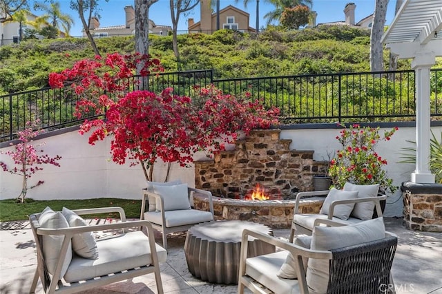12 Argos, Laguna Niguel, CA 92677 - view of patio / terrace with an outdoor stone fireplace