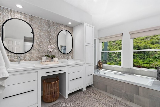 12 Argos, Laguna Niguel, CA 92677 - bathroom with double vanity, a bath, tile patterned flooring, recessed lighting, and decorative backsplash