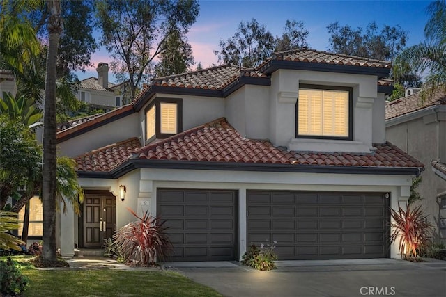 12 Argos, Laguna Niguel, CA 92677 - mediterranean / spanish house featuring a tile roof, driveway, and stucco siding