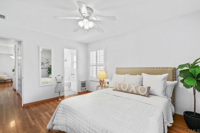 4719 Constance Dr, San Diego, CA 92115 - bedroom with wood finished floors, heating unit, baseboards, and ensuite bath