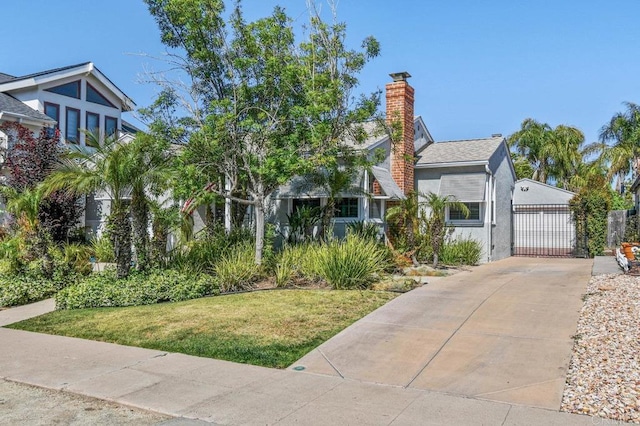4719 Constance Dr, San Diego, CA 92115 - view of front of home with a front yard, a chimney, and a detached garage