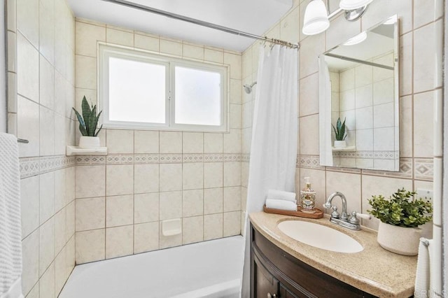 4719 Constance Dr, San Diego, CA 92115 - full bathroom with tile walls, vanity, shower / bath combo, and tasteful backsplash