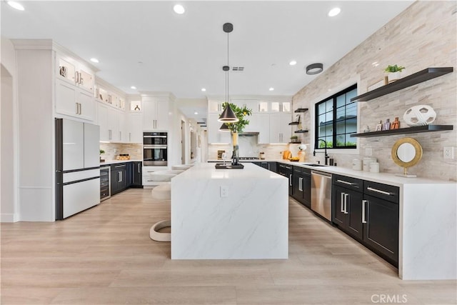 4947 Heleo Ave, Temple City, CA 91780 - kitchen featuring white fridge, dishwasher, open shelves, a sink, and white cabinets