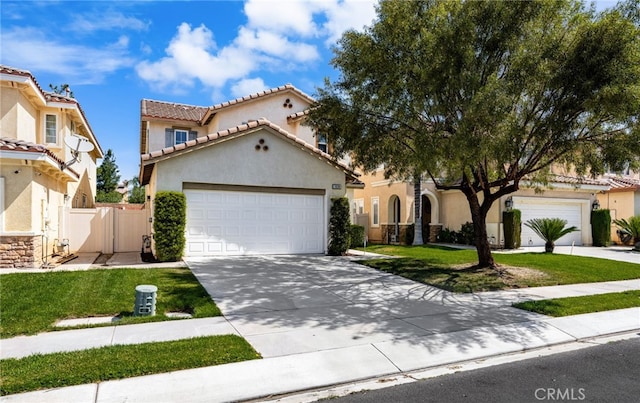 1634 Rigel St, Beaumont, CA 92223 - mediterranean / spanish-style home featuring driveway, stucco siding, a garage, and a tiled roof