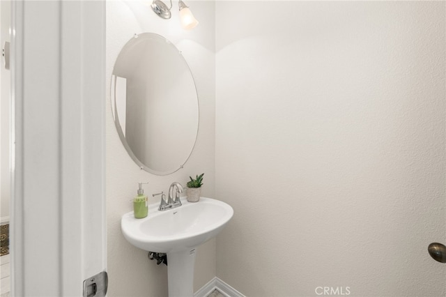1634 Rigel St, Beaumont, CA 92223 - bathroom featuring baseboards