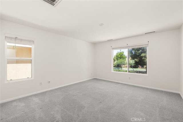1634 Rigel St, Beaumont, CA 92223 - carpeted empty room featuring baseboards