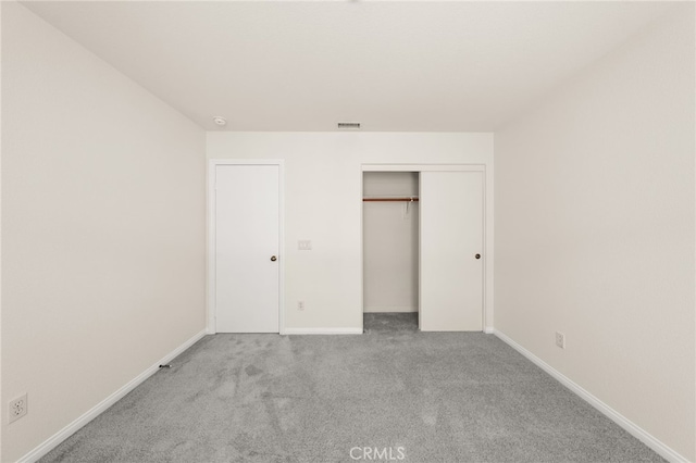 1634 Rigel St, Beaumont, CA 92223 - unfurnished bedroom featuring carpet, baseboards, and a closet