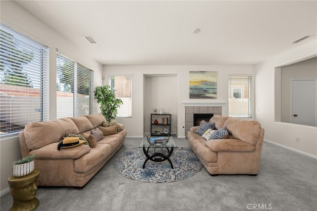 1634 Rigel St, Beaumont, CA 92223 - living room featuring a fireplace, carpet, and baseboards