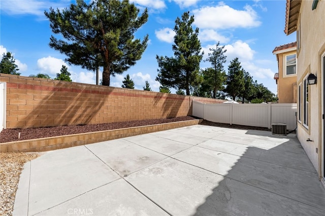 1634 Rigel St, Beaumont, CA 92223 - fenced backyard featuring a patio and cooling unit