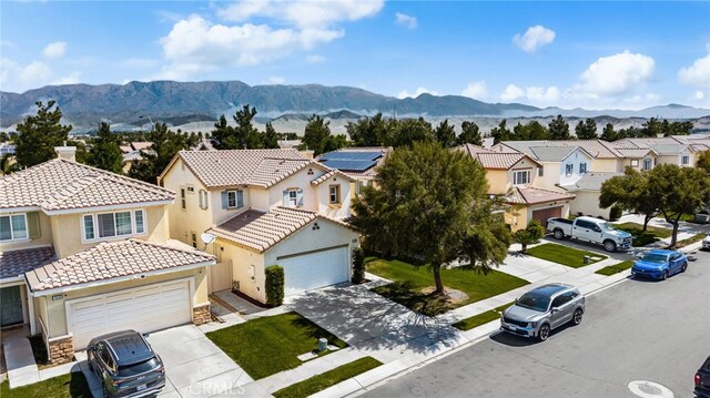 1634 Rigel St, Beaumont, CA 92223 - aerial perspective of suburban area featuring a mountainous background