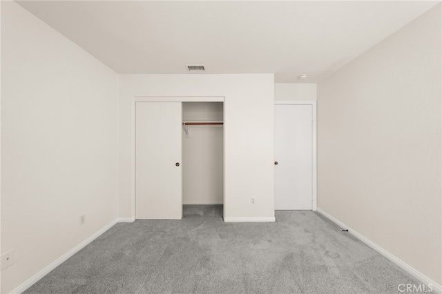 1634 Rigel St, Beaumont, CA 92223 - unfurnished bedroom featuring carpet floors, baseboards, and a closet