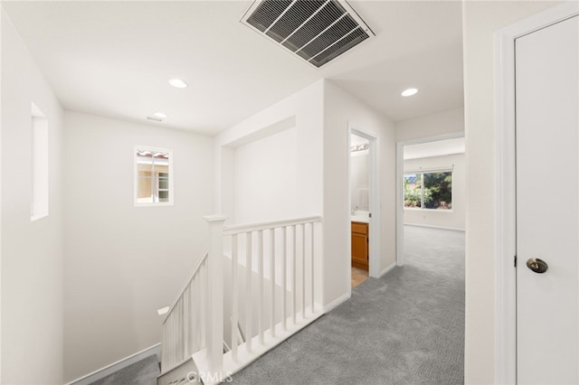 1634 Rigel St, Beaumont, CA 92223 - corridor featuring an upstairs landing, carpet, recessed lighting, and baseboards