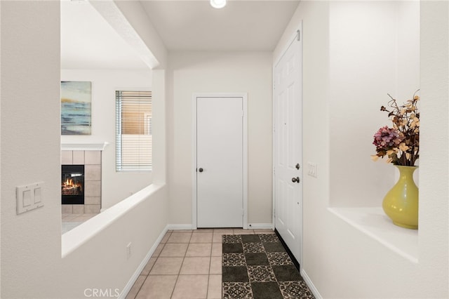 1634 Rigel St, Beaumont, CA 92223 - corridor featuring baseboards and tile patterned flooring