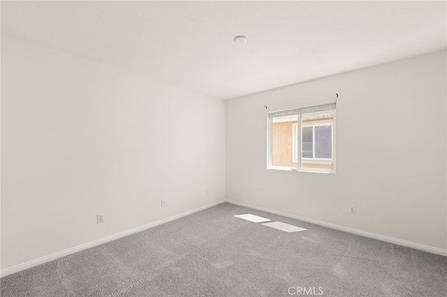 1634 Rigel St, Beaumont, CA 92223 - unfurnished room featuring baseboards and carpet