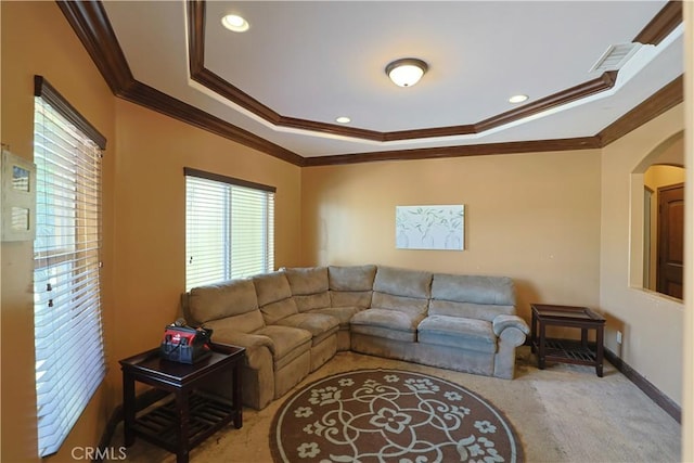 22331 Walnut St, Wildomar, CA 92595 - living area featuring crown molding, arched walkways, carpet, a raised ceiling, and baseboards