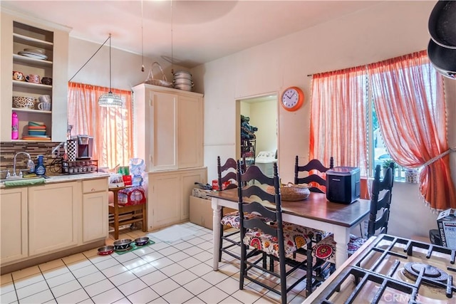 2202 Gates St, Lincoln Heights, CA 90031 - dining area with light tile patterned floors