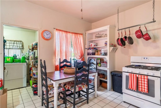 2202 Gates St, Lincoln Heights, CA 90031 - dining room featuring washer / dryer and light tile patterned floors