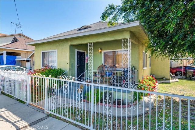 2202 Gates St, Lincoln Heights, CA 90031 - view of front of house with stucco siding and covered porch
