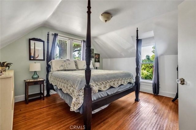 8213 Ocean View Ave, Whittier, CA 90602 - bedroom featuring lofted ceiling, baseboards, and wood finished floors