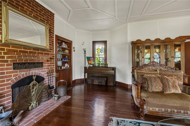 8213 Ocean View Ave, Whittier, CA 90602 - living room with built in shelves, wood finished floors, baseboards, and a fireplace