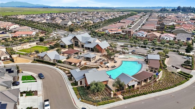 748 Expedition Way W, Madera, CA 93636 - aerial perspective of suburban area with a pool area