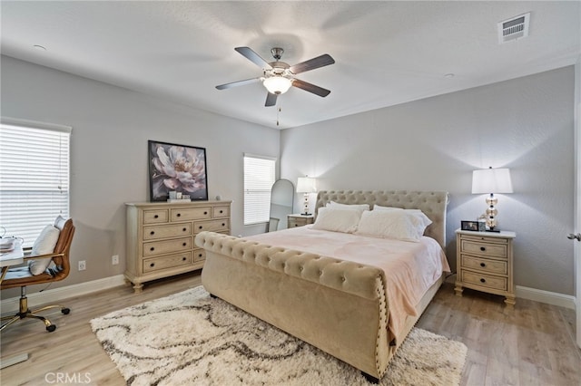 748 Expedition Way W, Madera, CA 93636 - bedroom featuring light wood-style floors, baseboards, and ceiling fan