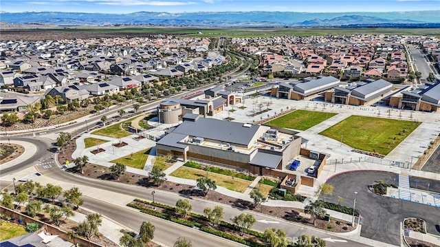 748 Expedition Way W, Madera, CA 93636 - aerial perspective of suburban area with a mountainous background