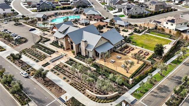 748 Expedition Way W, Madera, CA 93636 - aerial view of residential area with a pool area