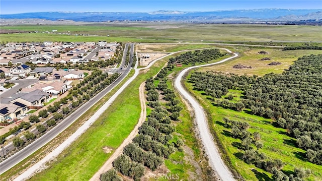 748 Expedition Way W, Madera, CA 93636 - aerial view of residential area with mountains