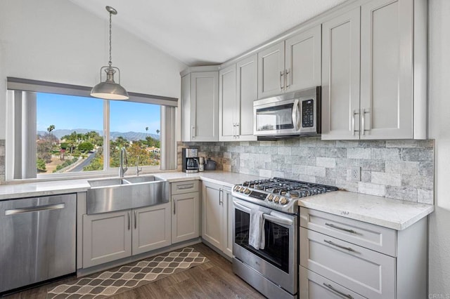 3016 Alta Vista Dr, Fallbrook, CA 92028 - kitchen featuring appliances with stainless steel finishes, a sink, lofted ceiling, tasteful backsplash, and dark wood-type flooring