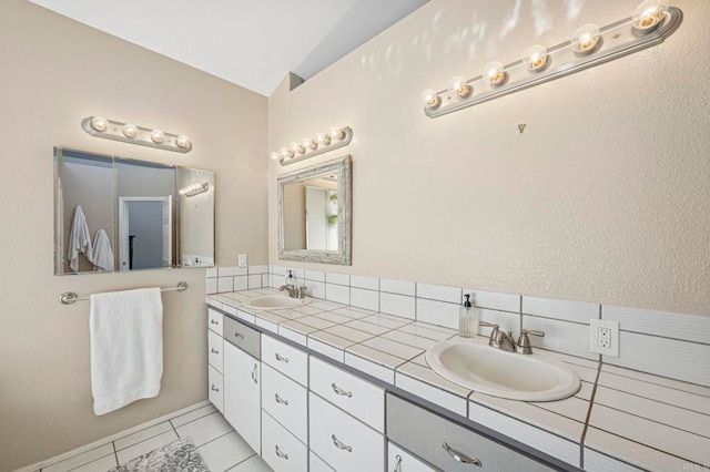 3016 Alta Vista Dr, Fallbrook, CA 92028 - full bath featuring double vanity, backsplash, and tile patterned flooring