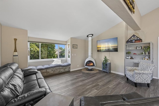 3016 Alta Vista Dr, Fallbrook, CA 92028 - living area featuring lofted ceiling, wood finished floors, a wood stove, and baseboards