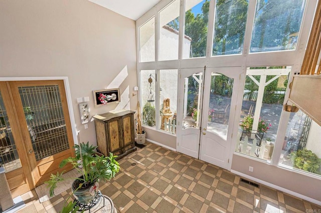 3016 Alta Vista Dr, Fallbrook, CA 92028 - doorway to outside with baseboards, healthy amount of natural light, a high ceiling, and tile patterned floors