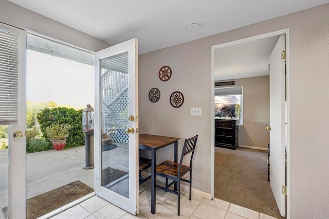 3016 Alta Vista Dr, Fallbrook, CA 92028 - dining room with light tile patterned floors, light colored carpet, and baseboards