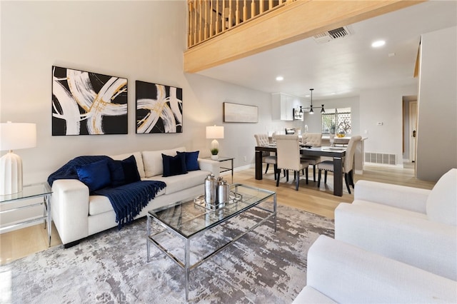 77 Lakepines, Irvine, CA 92620 - living area featuring light wood-style flooring, baseboards, and recessed lighting
