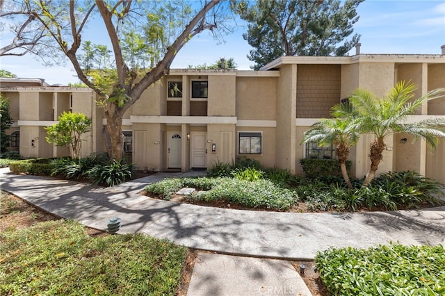 77 Lakepines, Irvine, CA 92620 - view of front of property featuring stucco siding
