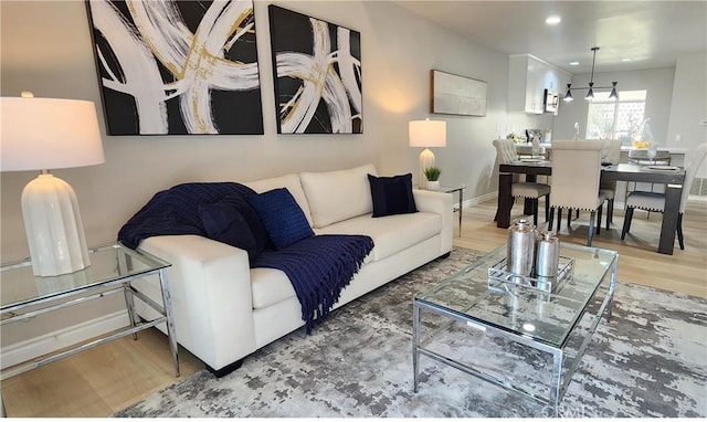 77 Lakepines, Irvine, CA 92620 - living room with wood finished floors, baseboards, and recessed lighting