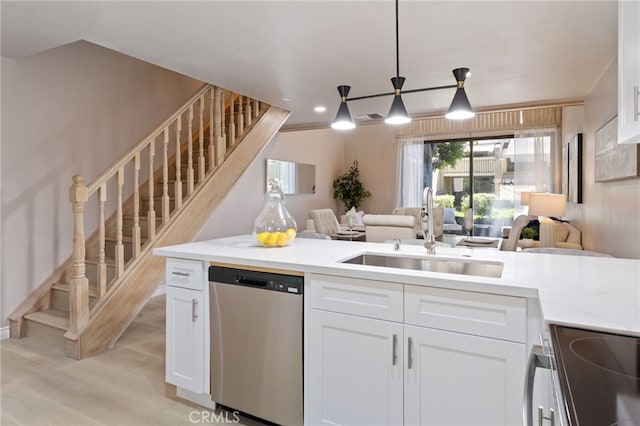 77 Lakepines, Irvine, CA 92620 - kitchen with appliances with stainless steel finishes, a sink, open floor plan, white cabinets, and recessed lighting