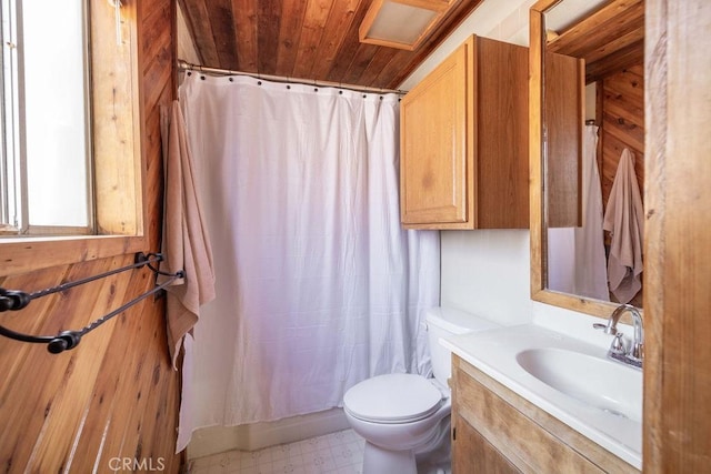 817 E Mountain View Blvd, Big Bear City, CA 92314 - bathroom featuring toilet, vanity, a shower with shower curtain, wooden ceiling, and tile patterned floors