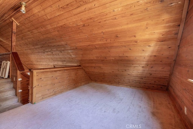 817 E Mountain View Blvd, Big Bear City, CA 92314 - additional living space with wood walls, carpet floors, wooden ceiling, and lofted ceiling