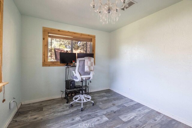 817 E Mountain View Blvd, Big Bear City, CA 92314 - office area featuring wood finished floors, a chandelier, and baseboards