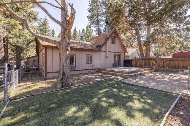 817 E Mountain View Blvd, Big Bear City, CA 92314 - back of property featuring a wooden deck and roof with shingles