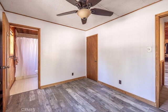817 E Mountain View Blvd, Big Bear City, CA 92314 - empty room featuring ornamental molding, wood finished floors, a ceiling fan, and baseboards