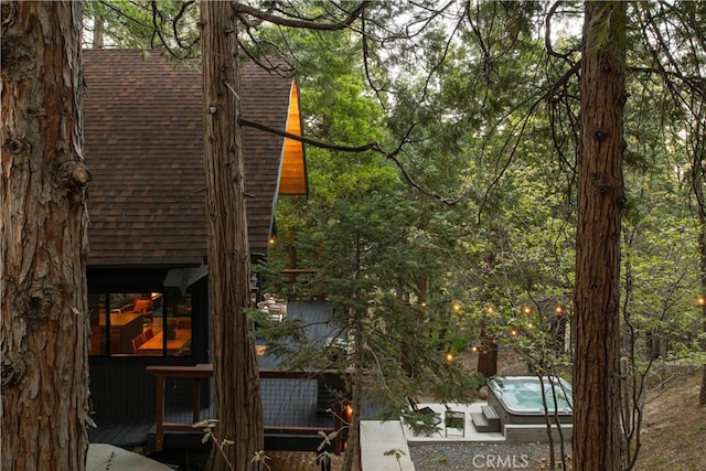 607 Old Toll Rd, Lake Arrowhead, CA 92352 - view of side of home featuring roof with shingles
