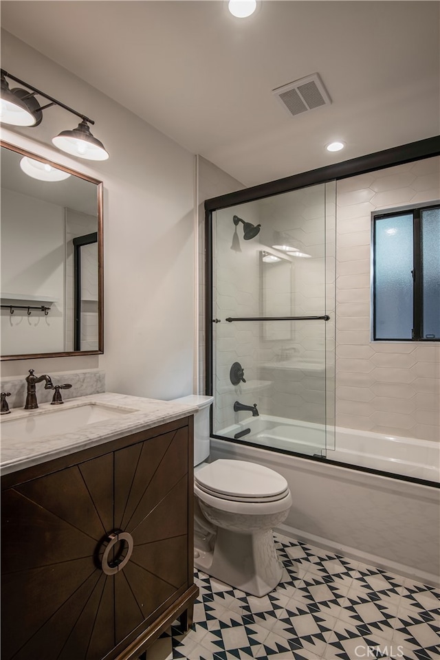607 Old Toll Rd, Lake Arrowhead, CA 92352 - bathroom with vanity, toilet, enclosed tub / shower combo, recessed lighting, and tile patterned floors