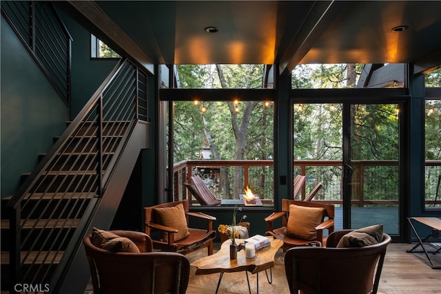 607 Old Toll Rd, Lake Arrowhead, CA 92352 - sunroom / solarium with wood finished floors, a wooden deck, healthy amount of natural light, and floor to ceiling windows